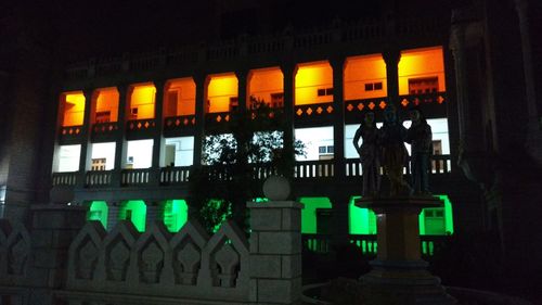 Statue of illuminated building