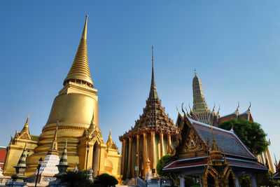 Low angle view of temple against building