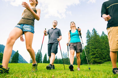 Low angle view of fiends walking on land