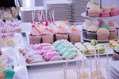 Multi colored sweet food on table