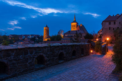 Buildings in city at night