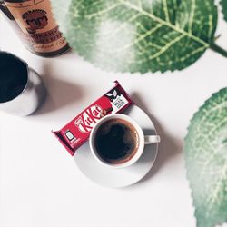 High angle view of coffee cup on table