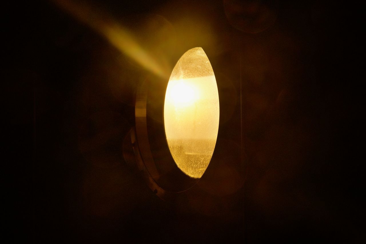 light, yellow, darkness, illuminated, incandescent light bulb, lighting equipment, reflection, lighting, circle, no people, glowing, sunlight, dark, macro photography, light bulb, indoors, electricity, light fixture, close-up, light - natural phenomenon, candle, copy space, lamp