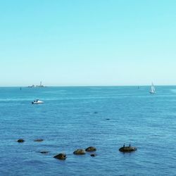 Boat sailing in sea