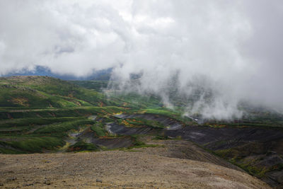 Scenic view of land against sky