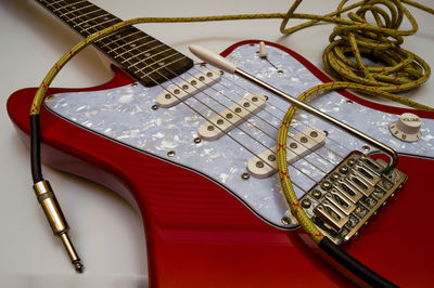 High angle view of guitar on table