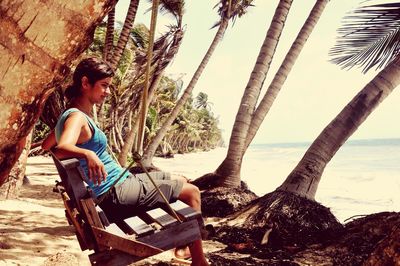 People relaxing on beach