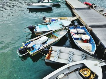 Boats moored at harbor