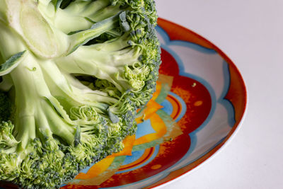 High angle view of vegetables in plate on table