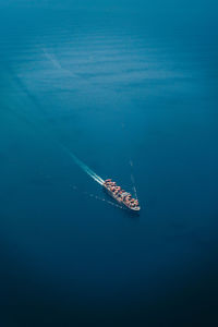 High angle view of ship sailing in sea