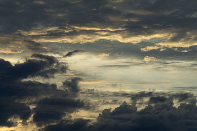 Low angle view of dramatic sky during sunset