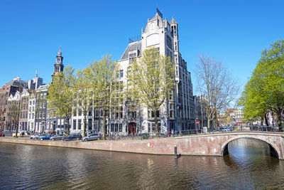 City scenic from amsterdam in spring in the netherlands with the westerkerk