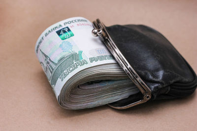 High angle view of paper currency on table