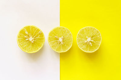 Directly above shot of fruits against white background