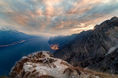 Scenic view of mountains against cloudy sky