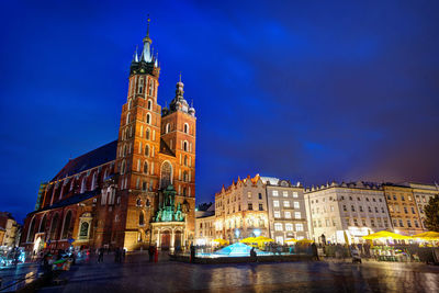 View of illuminated buildings at night