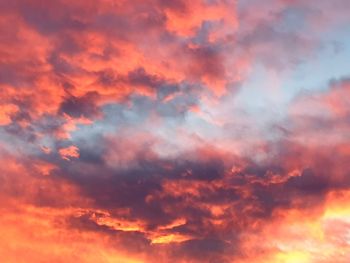 Low angle view of dramatic sky during sunset