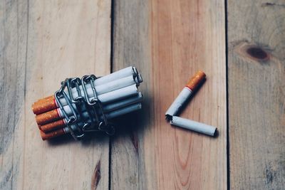 High angle view of cigarette on table