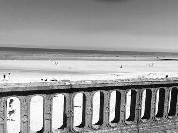 Scenic view of beach against clear sky