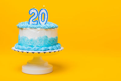 Close-up of cake against white background