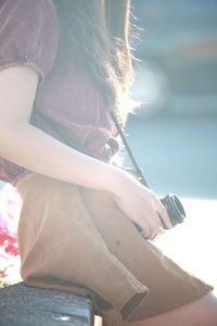 Woman sitting outdoors