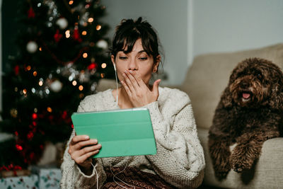 Young woman using digital tablet