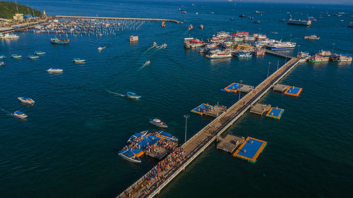 High angle view of commercial dock by sea