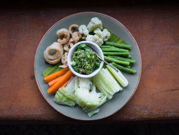 High angle view of chopped vegetables in bowl on table