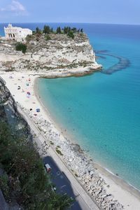 High angle view of swimming pool by sea against sky