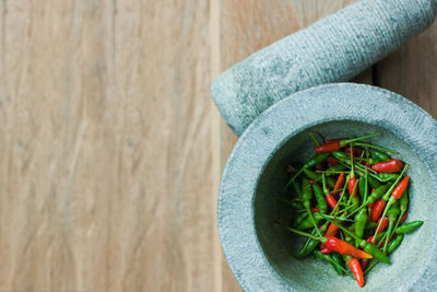 High angle view of vegetables in container on table