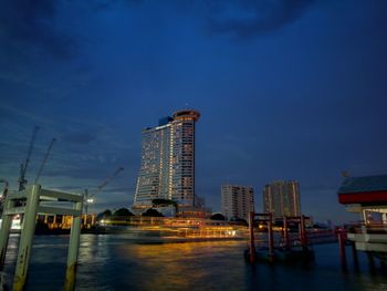 City lit up at waterfront