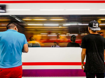 Man standing in train