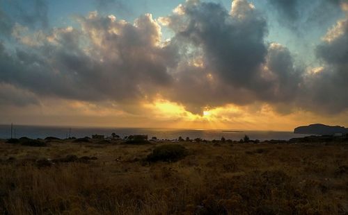 Scenic view of sea against cloudy sky