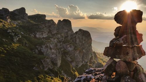 Scenic view of mountains against sky during sunset