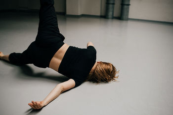 High angle view of woman dancing on floor