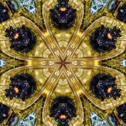 Close-up of illuminated lighting equipment against sky at night