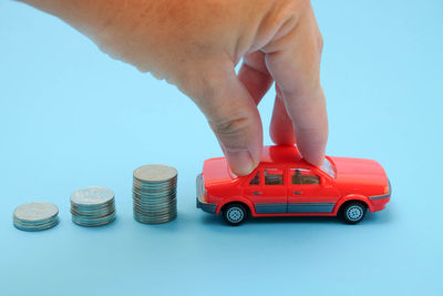 Close-up of toy car against blue background