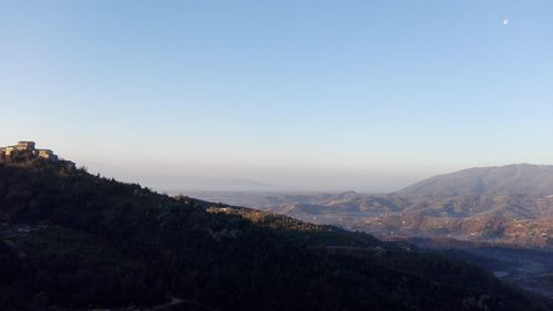 Scenic view of mountains against clear sky