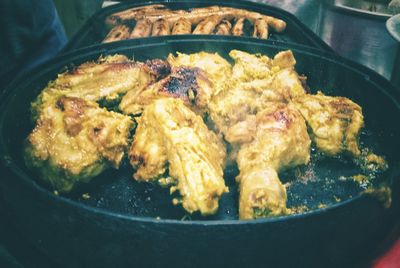 High angle view of meat in cooking pan