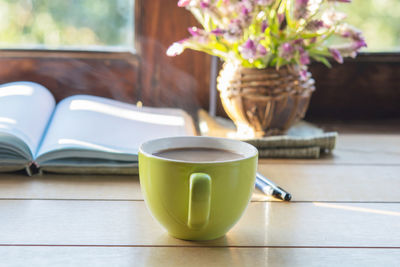 Coffee cup on table