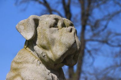 Low angle view of statue against sky