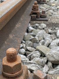 High angle view of stones on railroad track