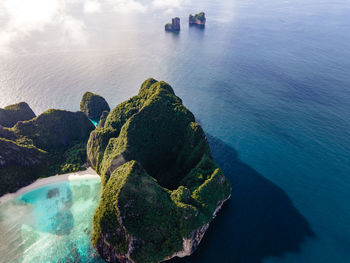 High angle view of rocks on sea