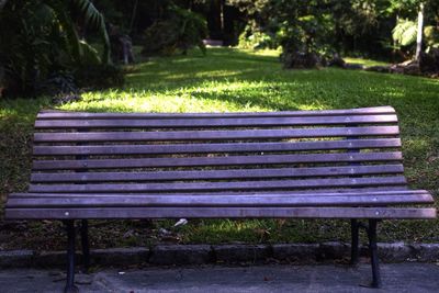 Empty bench in park
