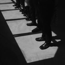 Low section of woman standing on floor