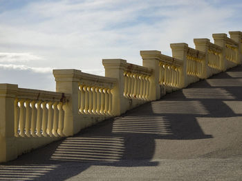 View of buildings against cloudy sky