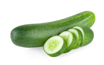 Close-up of green pepper against white background