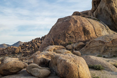 Scenic view of rock formations against sky