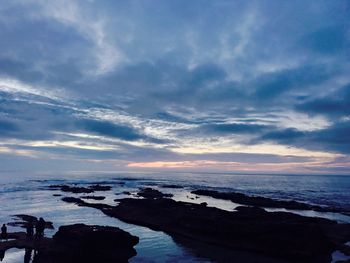 Scenic view of sea against sky at sunset