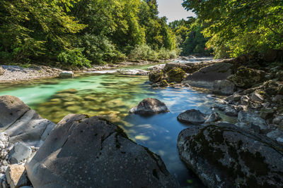 Boulders and rocks on the riverbed of the torre river. friuli to discover